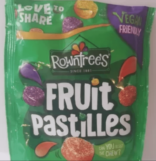 A green pack of Rowntree's Fruit Pastilles with "Vegan Friendly" and "Love to Share" labels on it.