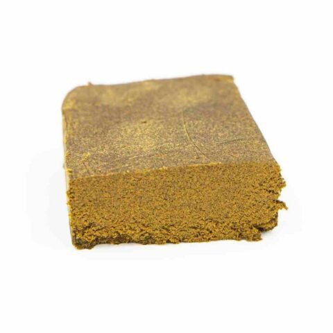 Solid block of Royal Cream Medical Grade Hashish - High-Quality Cannabis Extract.